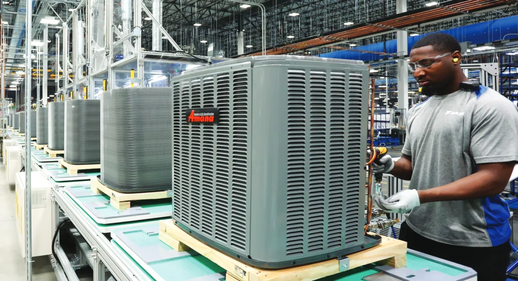 Filtration Services In Dallas, TX 1 amana heat pump assembly with employee